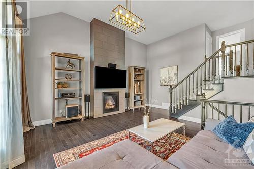 245 Saddleback Crescent, Kanata, ON - Indoor Photo Showing Living Room With Fireplace