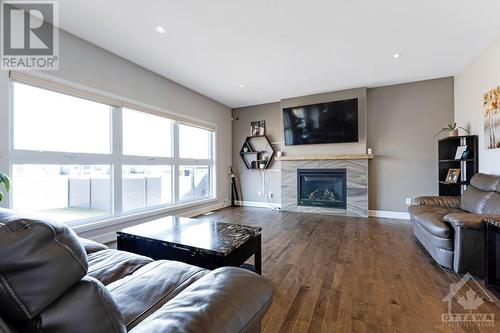 219 Capri Avenue, Embrun, ON - Indoor Photo Showing Living Room With Fireplace