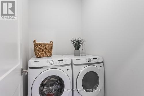 #13 -63 Compass Tr, Central Elgin, ON - Indoor Photo Showing Laundry Room