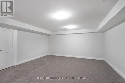 #13 -63 Compass Tr, Central Elgin, ON - Indoor Photo Showing Other Room