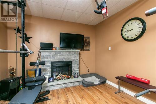185504 Grey Road 9, Southgate, ON - Indoor Photo Showing Gym Room With Fireplace