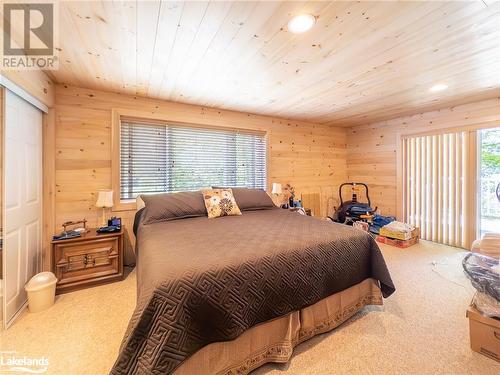 main floor primary bedroom - 1078A Lake Joseph Road, Seguin, ON - Indoor Photo Showing Bedroom