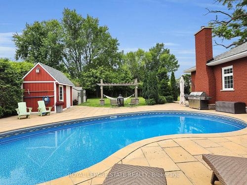 104 Main St E, Grimsby, ON - Outdoor With In Ground Pool With Backyard