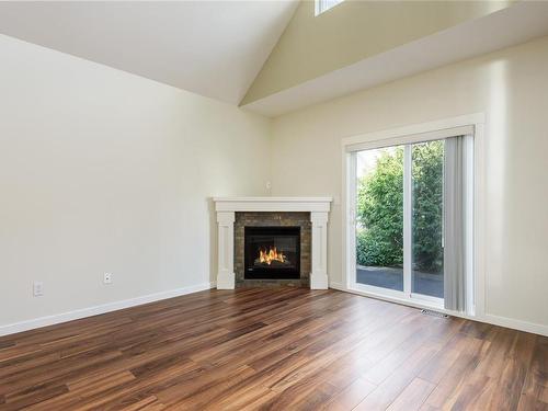 7-700 Lancaster Way, Comox, BC - Indoor Photo Showing Living Room With Fireplace