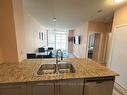 3301-4070 Confederation Pkwy E, Mississauga, ON  - Indoor Photo Showing Kitchen With Double Sink 