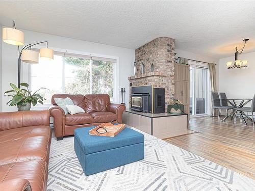 8-3341 Mary Anne Cres, Colwood, BC - Indoor Photo Showing Living Room With Fireplace