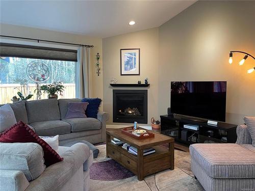 11-5450 Tomswood Rd, Port Alberni, BC - Indoor Photo Showing Living Room With Fireplace