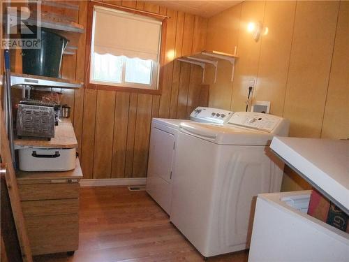Laundry team included! - 11878 Lanark Road, Calabogie, ON - Indoor Photo Showing Laundry Room