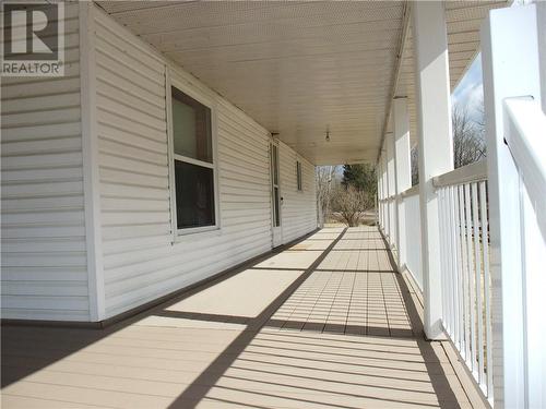 Maintenance free decking and railings along two sides! - 11878 Lanark Road, Calabogie, ON - Outdoor With Exterior