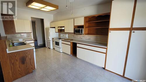 5 Marion Crescent, Meadow Lake, SK - Indoor Photo Showing Kitchen With Double Sink