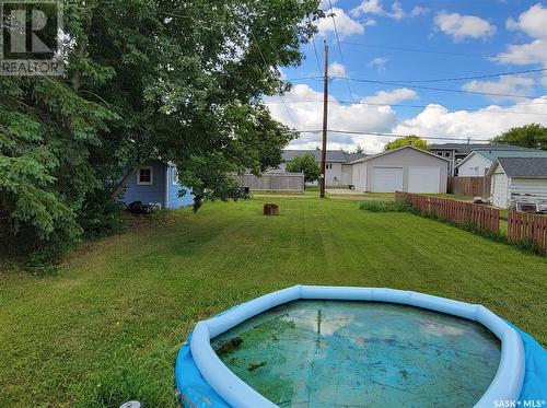248 4Th Avenue W, Unity, SK - Outdoor With Above Ground Pool With Backyard