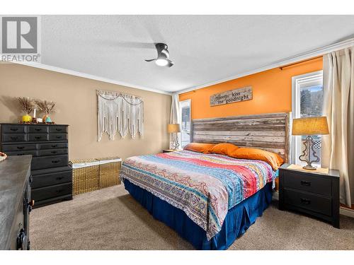 7527 Mccarthy Road, Bridge Lake, BC - Indoor Photo Showing Bedroom