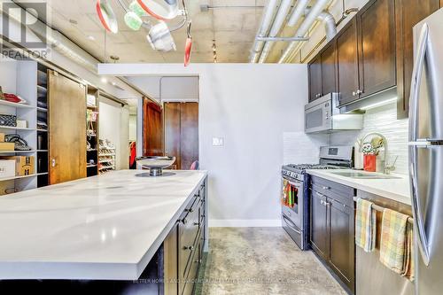 303 - 261 King Street E, Toronto, ON - Indoor Photo Showing Kitchen With Double Sink