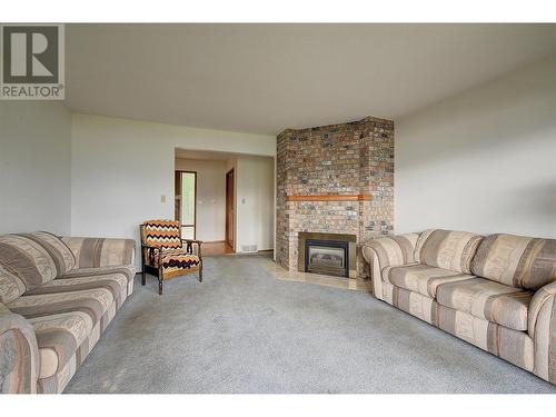 1181 Menu Road, West Kelowna, BC - Indoor Photo Showing Living Room With Fireplace