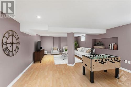Basement Recroom - Virtually Staged - 25 Renfrew Avenue, Ottawa, ON - Indoor Photo Showing Other Room
