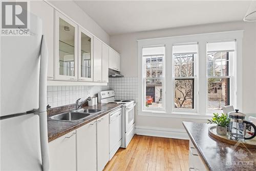 Kitchen - Main Level - 25 Renfrew Avenue, Ottawa, ON - Indoor Photo Showing Kitchen With Double Sink