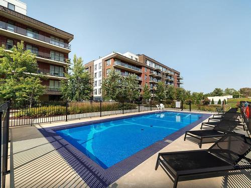 Pool - 501-4 Av. Donegani, Pointe-Claire, QC - Outdoor With In Ground Pool With Balcony
