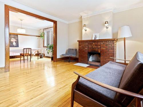 Living room - 4413 Av. Harvard, Montréal (Côte-Des-Neiges/Notre-Dame-De-Grâce), QC - Indoor Photo Showing Living Room With Fireplace