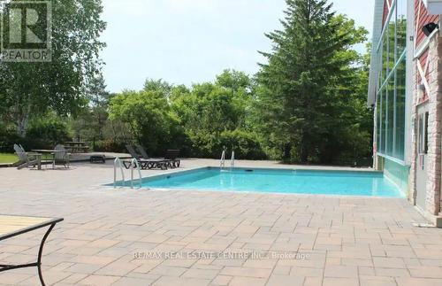 2448-49 - 90 Highland Drive, Oro-Medonte, ON - Outdoor With In Ground Pool