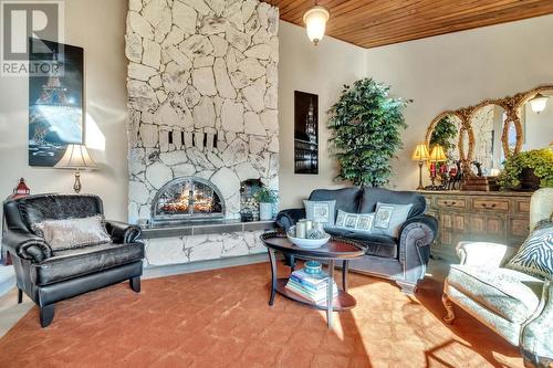 2463 Irvine Ave, Merritt, BC - Indoor Photo Showing Living Room With Fireplace