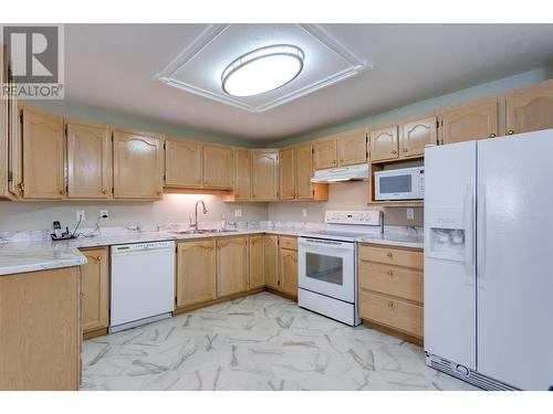 2477 Ingram Road Unit# 104, West Kelowna, BC - Indoor Photo Showing Kitchen With Double Sink