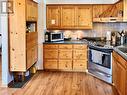 7115 Connie Road, Bridge Lake, BC  - Indoor Photo Showing Kitchen 