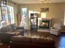 31 701 Mcintosh Street E, Swift Current, SK  - Indoor Photo Showing Living Room With Fireplace 