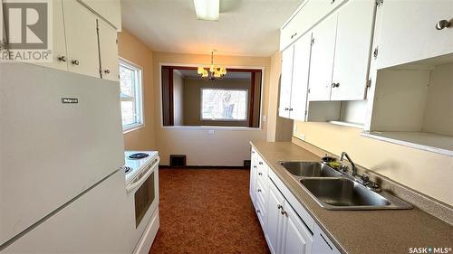 761 4Th Street E, Prince Albert, SK - Indoor Photo Showing Kitchen With Double Sink