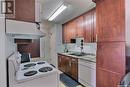 313 1580 Olive Diefenbaker Drive, Prince Albert, SK  - Indoor Photo Showing Kitchen With Double Sink 