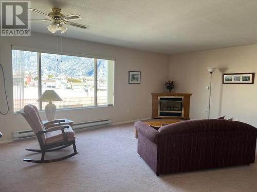 8006 Vedette Drive Unit# 201A, Osoyoos, BC - Indoor Photo Showing Other Room With Fireplace