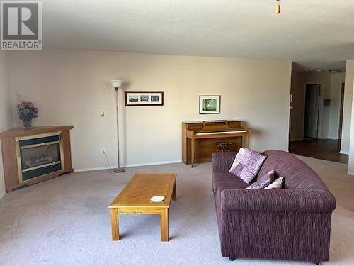 8006 Vedette Drive Unit# 201A, Osoyoos, BC - Indoor Photo Showing Living Room With Fireplace