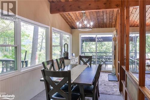 Views of the trees and front deck - 5335 Claresbridge Lane, Washago, ON - Indoor Photo Showing Dining Room