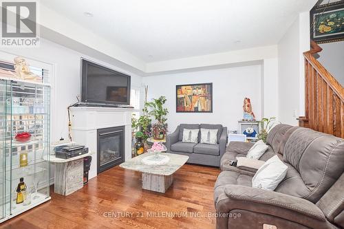4444 Saw Mill Dr, Niagara Falls, ON - Indoor Photo Showing Living Room With Fireplace