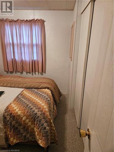 302694 Douglas Street, West Grey, ON - Indoor Photo Showing Bedroom