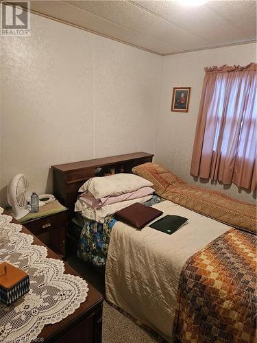 302694 Douglas Street, West Grey, ON - Indoor Photo Showing Bedroom