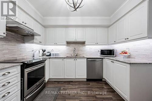 #624 -140 Widdicombe Hill Blvd, Toronto, ON - Indoor Photo Showing Kitchen With Upgraded Kitchen