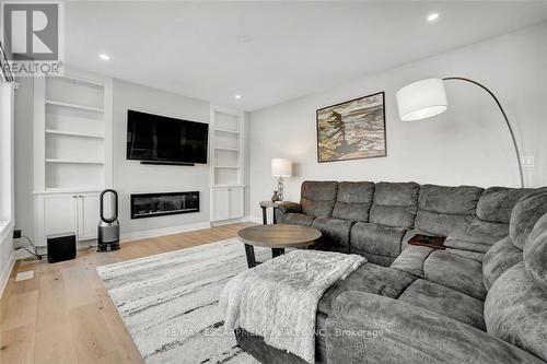 7 Lightfeather Place, Hamilton, ON - Indoor Photo Showing Living Room With Fireplace