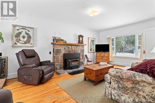 1111 Clipsham Road, Gravenhurst, ON - Indoor Photo Showing Living Room With Fireplace