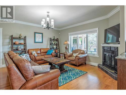 9474 Buchanan Road, Coldstream, BC - Indoor Photo Showing Living Room With Fireplace