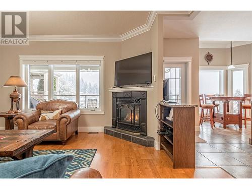 9474 Buchanan Road, Coldstream, BC - Indoor Photo Showing Living Room With Fireplace