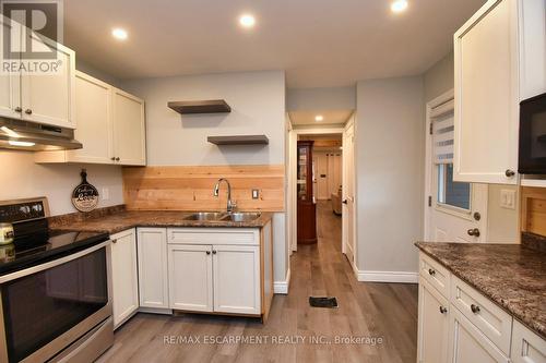 148 Crosthwaite Ave N, Hamilton, ON - Indoor Photo Showing Kitchen With Double Sink