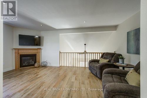 #24 -175 Ingersoll St N, Ingersoll, ON - Indoor Photo Showing Living Room With Fireplace