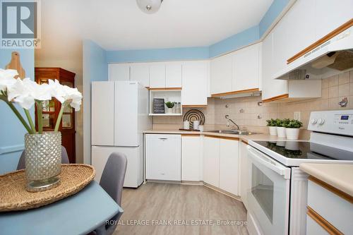 #108 -8 Huron St, Kawartha Lakes, ON - Indoor Photo Showing Kitchen With Double Sink