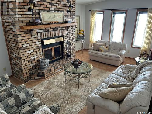 29 Lake Avenue, Martinsons Beach, SK - Indoor Photo Showing Living Room With Fireplace