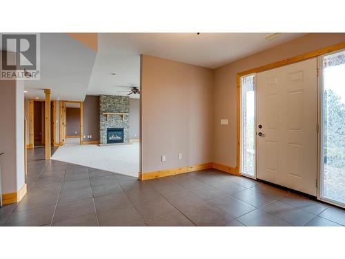 464 Mountain Drive, Vernon, BC - Indoor Photo Showing Other Room With Fireplace