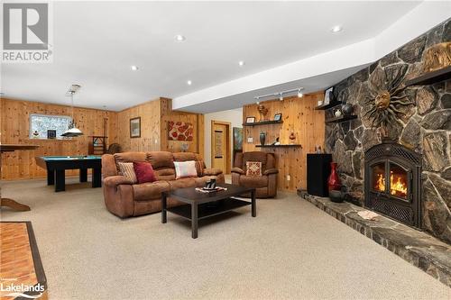 Walk-Out Basement Living Space. - 1083 Riding Ranch Road, Machar Twp, ON - Indoor With Fireplace