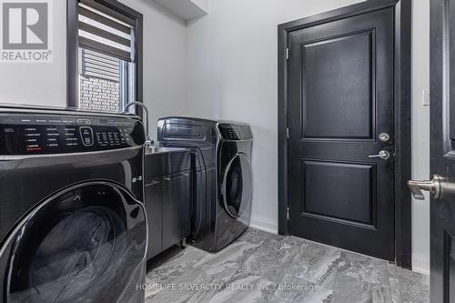 1046 Eagletrace Dr, Middlesex Centre, ON - Indoor Photo Showing Laundry Room