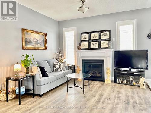 230 Roy Dr, Clearview, ON - Indoor Photo Showing Living Room With Fireplace
