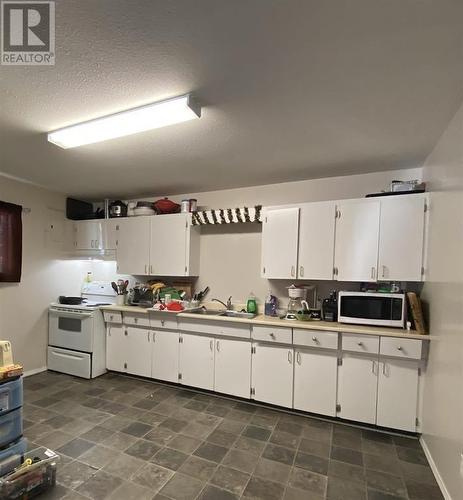 3911 Paquette Avenue, Terrace, BC - Indoor Photo Showing Kitchen With Double Sink
