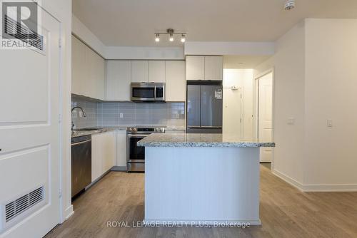 #610 -4699 Glen Erin Dr, Mississauga, ON - Indoor Photo Showing Kitchen With Stainless Steel Kitchen With Upgraded Kitchen